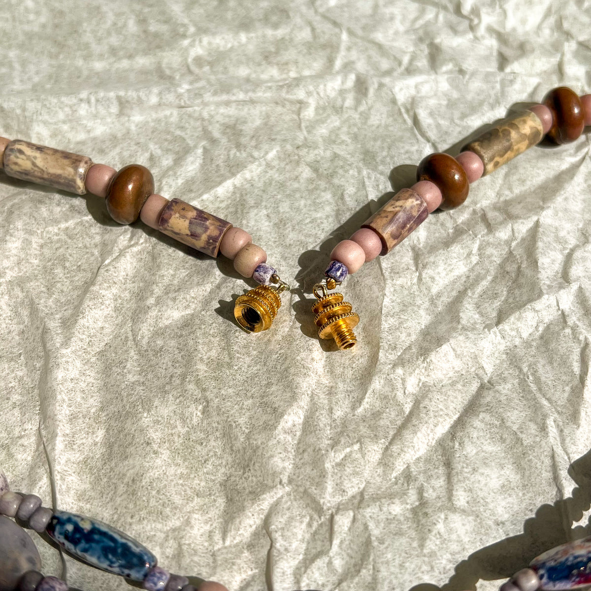 1970s Shades of Purple Triple-Strand Beaded Necklace