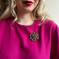 1950s Circular Brooch With Iridescent Pink Rhinestones