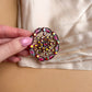 1950s Circular Brooch With Iridescent Pink Rhinestones