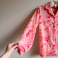 1970s Pink Button-Down Blouse With Floral Pattern (S/M)