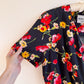 Flirty 1980s Black Dress With Floral Print (M/L)