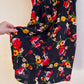 Flirty 1980s Black Dress With Floral Print (M/L)