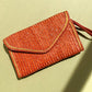 1970s Brown Raffia Clutch With Gold Trim