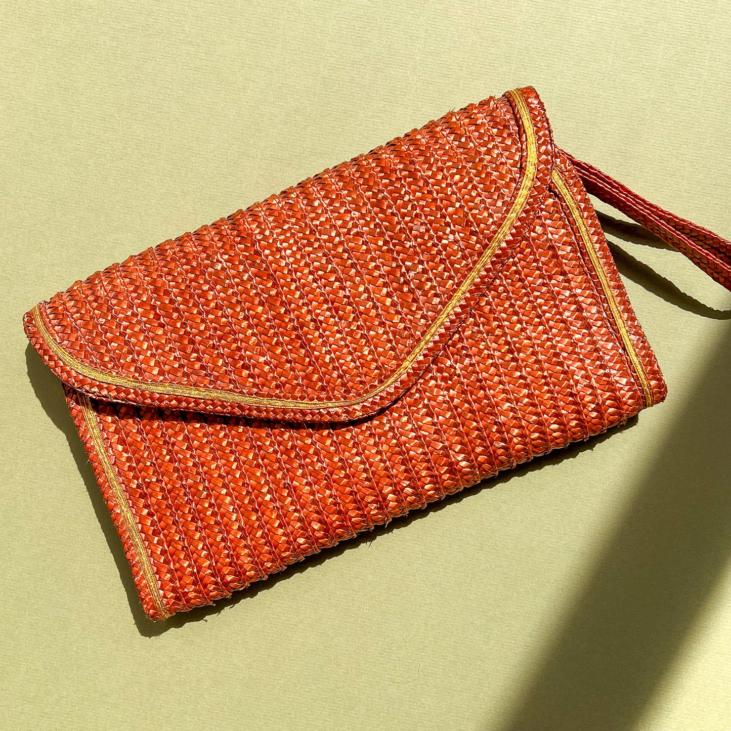 1970s Brown Raffia Clutch With Gold Trim