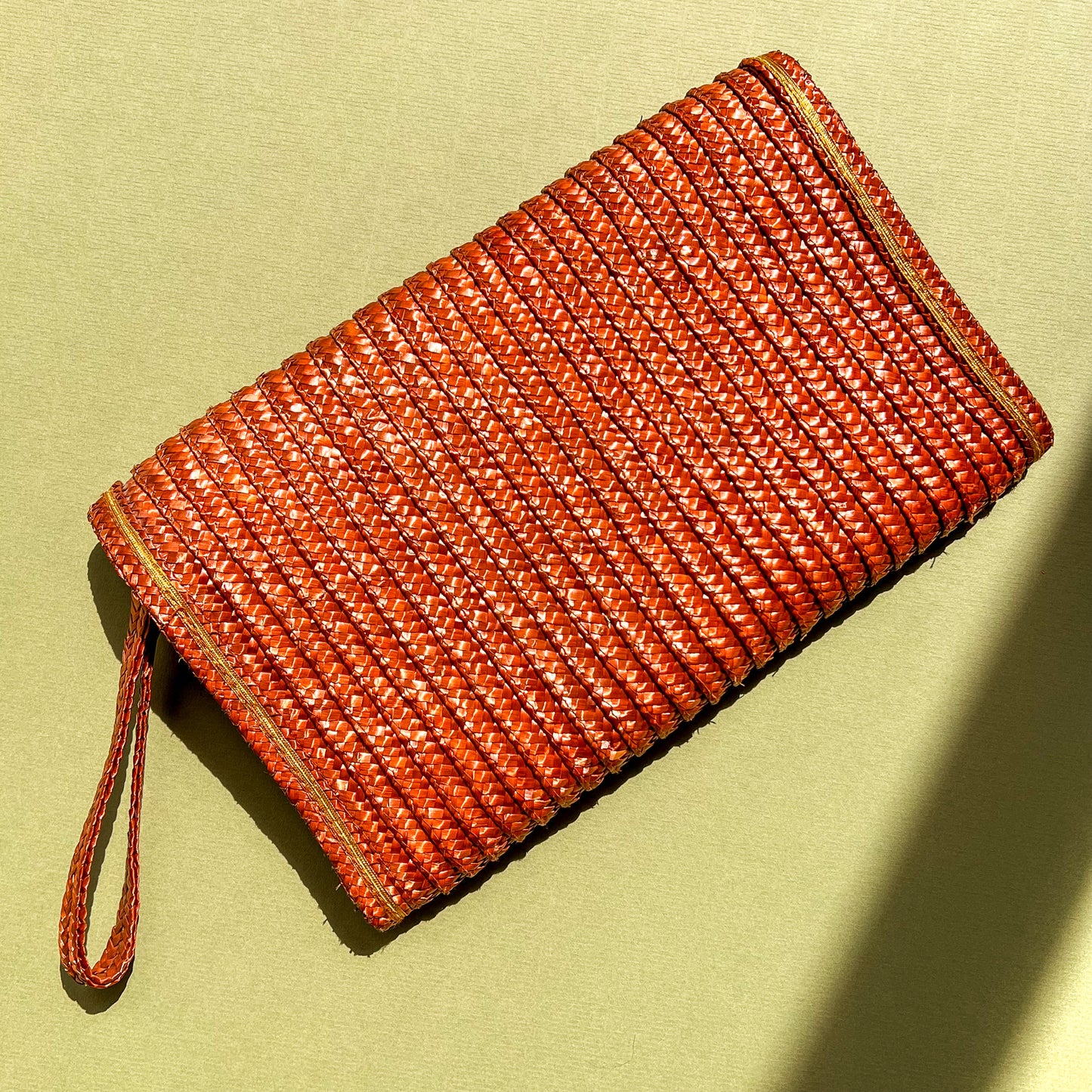 1970s Brown Raffia Clutch With Gold Trim
